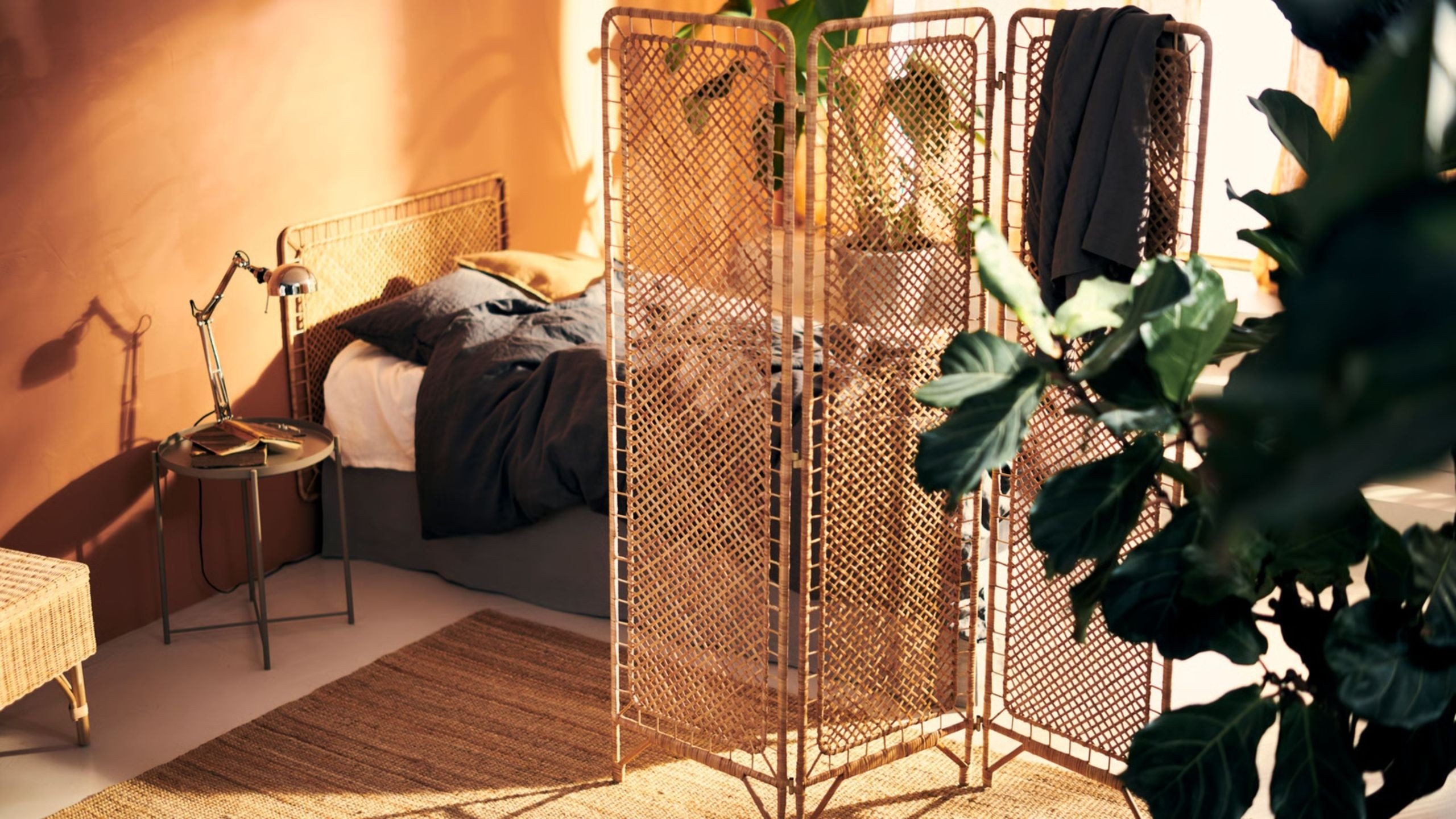 Create Distinct Studio Areas with a Folding Rattan Screen