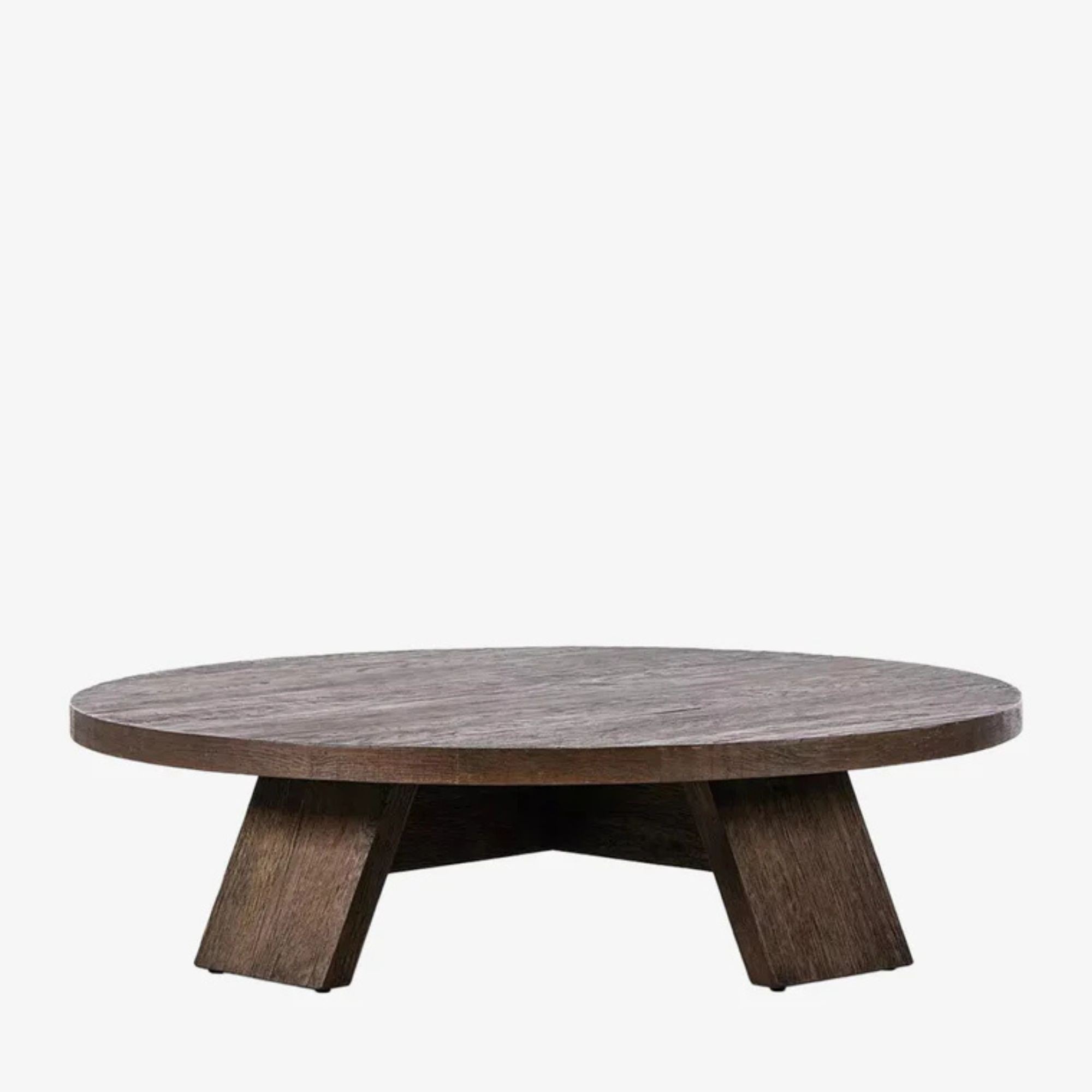 The Harvey Coffee Table in the reference shopping edit illustrates the organic central-table outline.