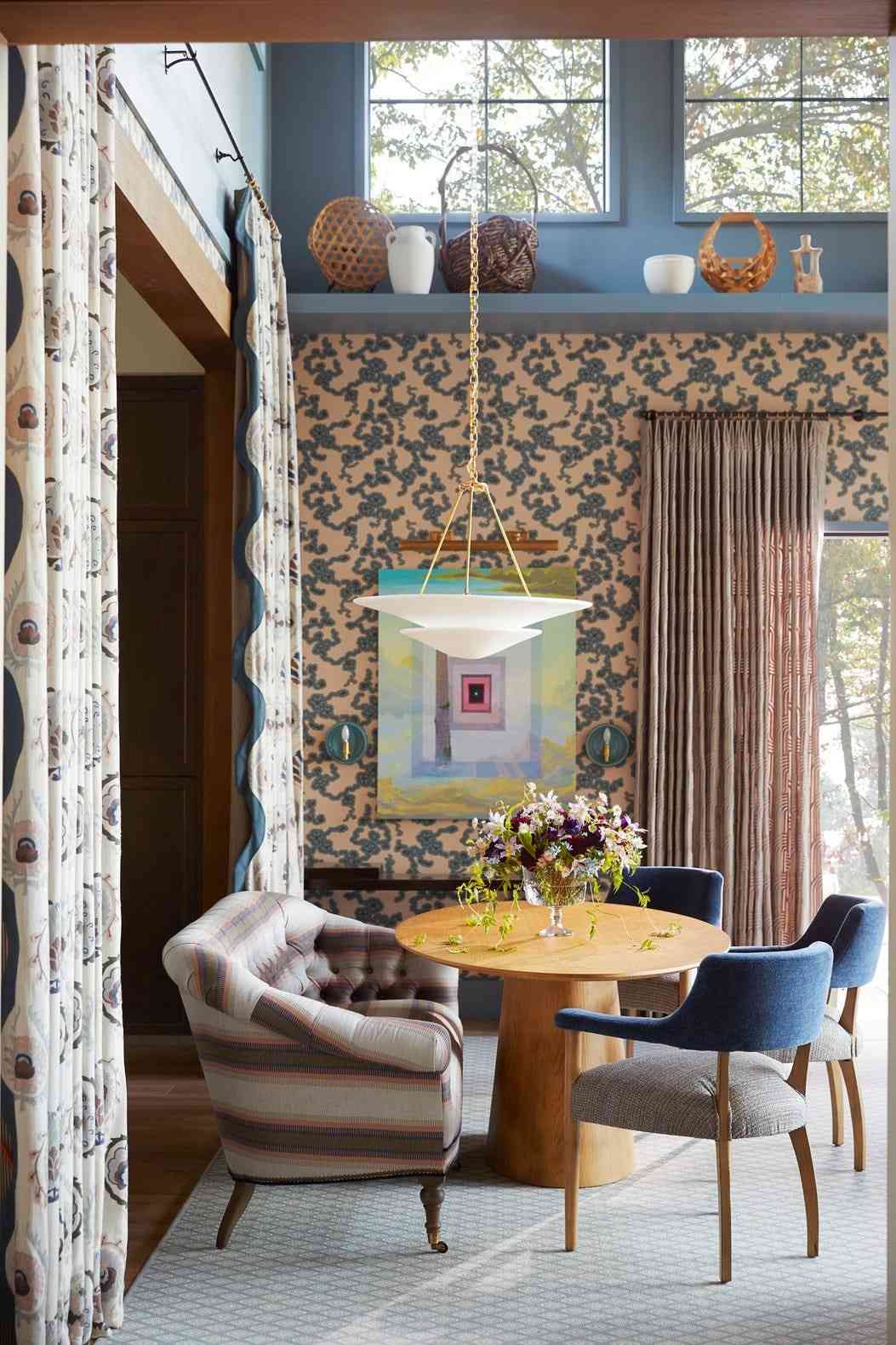 Dane Austin's Whole Home dining-space example with drapery, as featured in House Beautiful; photography credited to Brie Williams.