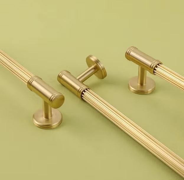 Decorative brass-toned cabinet pulls from the source shopping selection illustrate a targeted hardware change, subject to fit and maintenance needs.