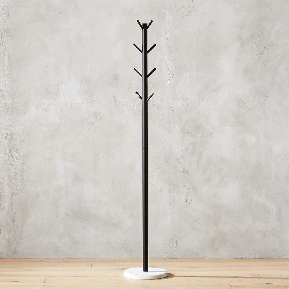 The reference shopping selection includes a freestanding coat tree as an option for guest coats, rather than as a required permanent entrance feature.