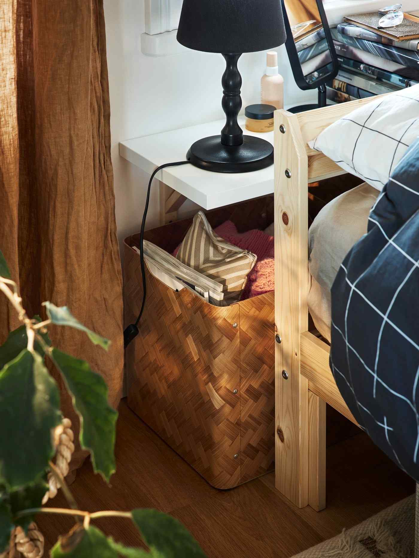 A separate source bedside detail shows a shelf behind the frame with a lamp above and a woven storage container below.