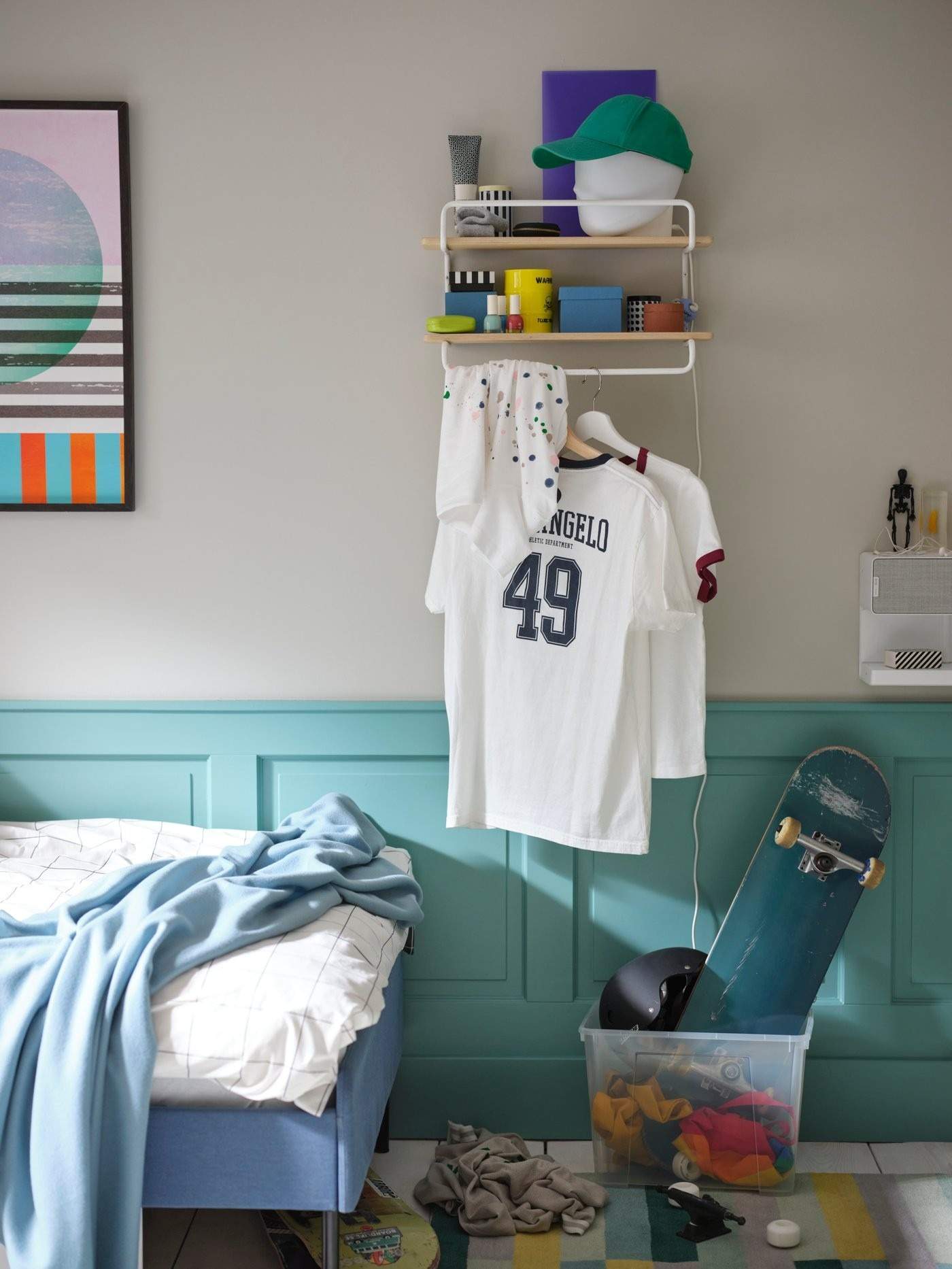 A source wall shelf stores a small selection above a hanging jersey, illustrating combined display and clothing storage.
