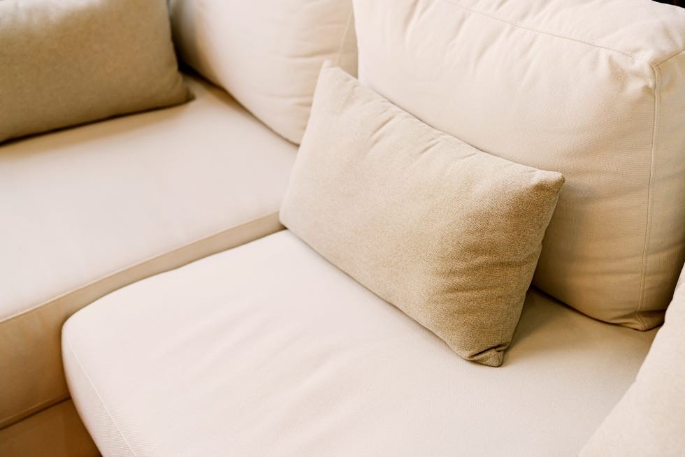 A source detail of sofa cushions accompanies the discussion of repeated use and suitable upholstery care.